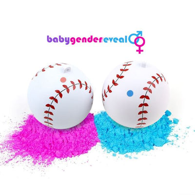 Two cricket balls on top of pink and blue powder
